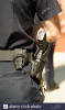 handgun-police-officers-glock-pistol-usa-police-officers-gun-held-A0GCGP.jpg