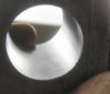 One inch hole in steel drilled with end mill for 7 eights 14 cleance in barrel vise 6-17-2011.jpg