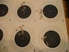 Best 10 shot groups with iron sights.jpg