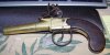 Low res left side of gun - london text and can see swords with crown.jpg