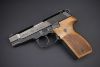 1920px-Walther_P88_with_Nill_wood_grips_%2832415095370%29.jpg