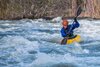 photo-of-man-paddling-kayak-in-raging-river-2250521.jpg