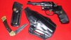 Smith and Wesson Model 10 and Buck 110 knife.jpg